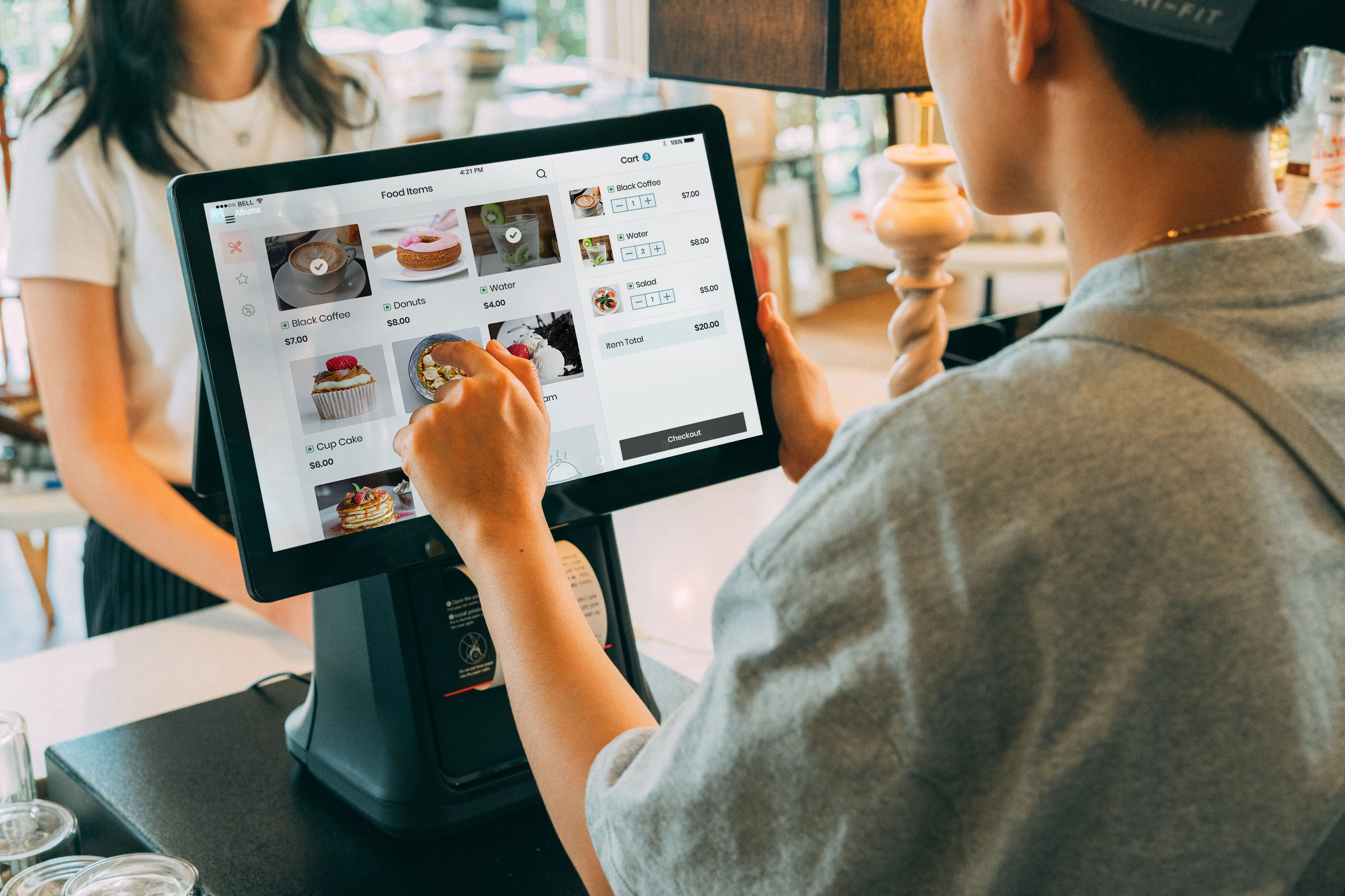 A modern Square POS terminal seamlessly integrated with a digital QR code ordering platform.